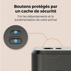 Boutons protégés par un cache de sécurité sur le distributeur de croquettes