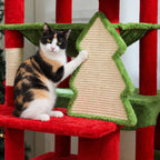 Chat faisant ses griffes sur l'arbre à Chat Noël